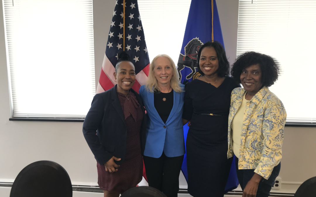 Mary Gay Scanlon along with the CEO and a board member from Campaign for Working Families.